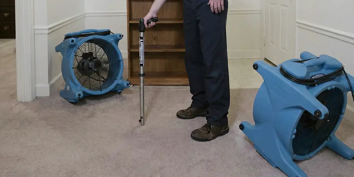 emergency water removal equipment deployed to dry a flooded residential interior in San Diego, CA