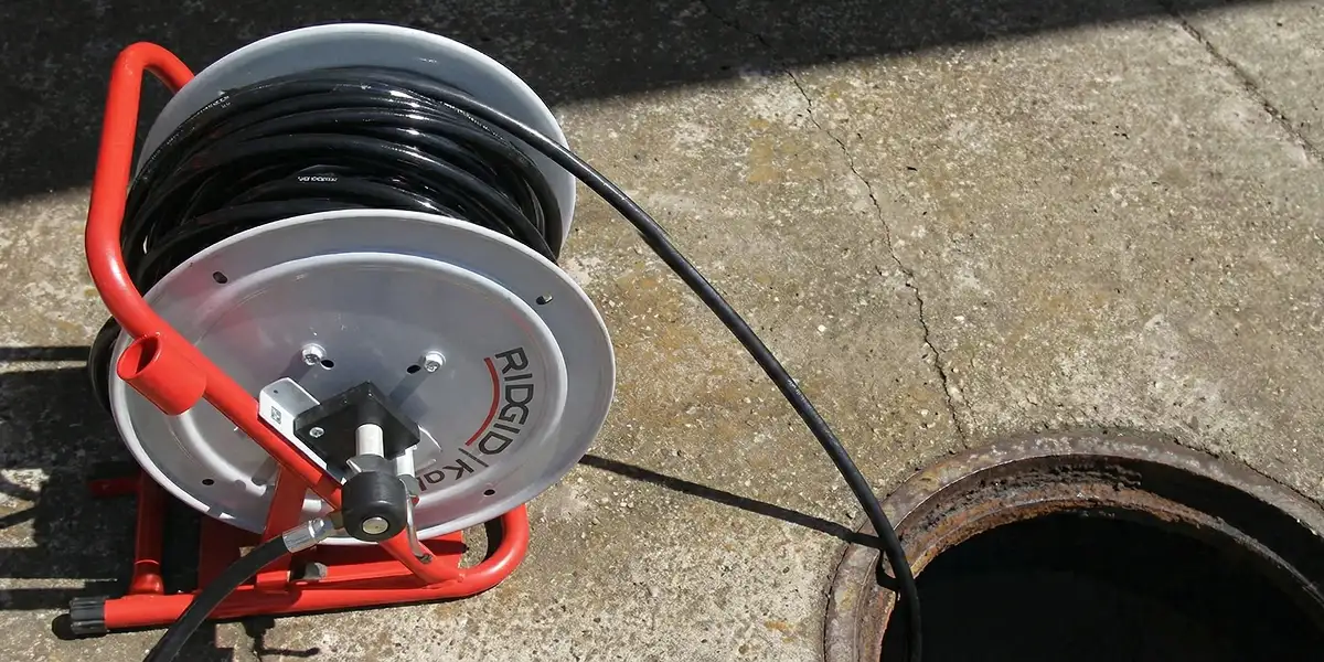 sewer rodding equipment prepared to clear clogged sewer lines in San Diego, CA