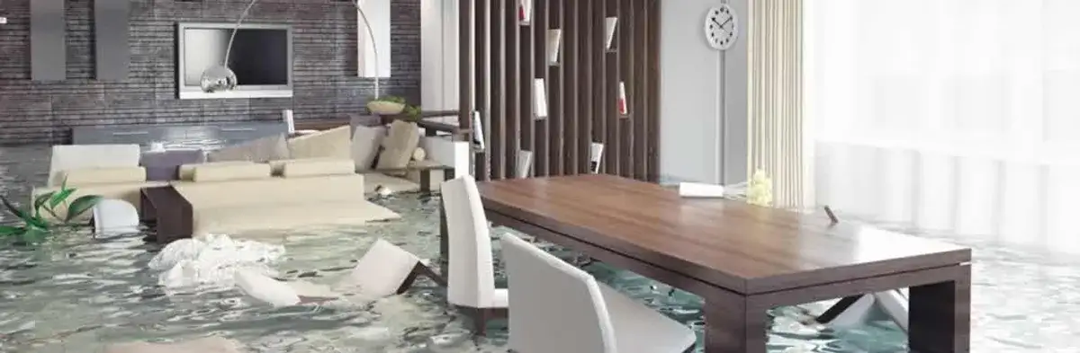 home interior affected by water damage with flooded floors and displaced furniture in San Diego, CA